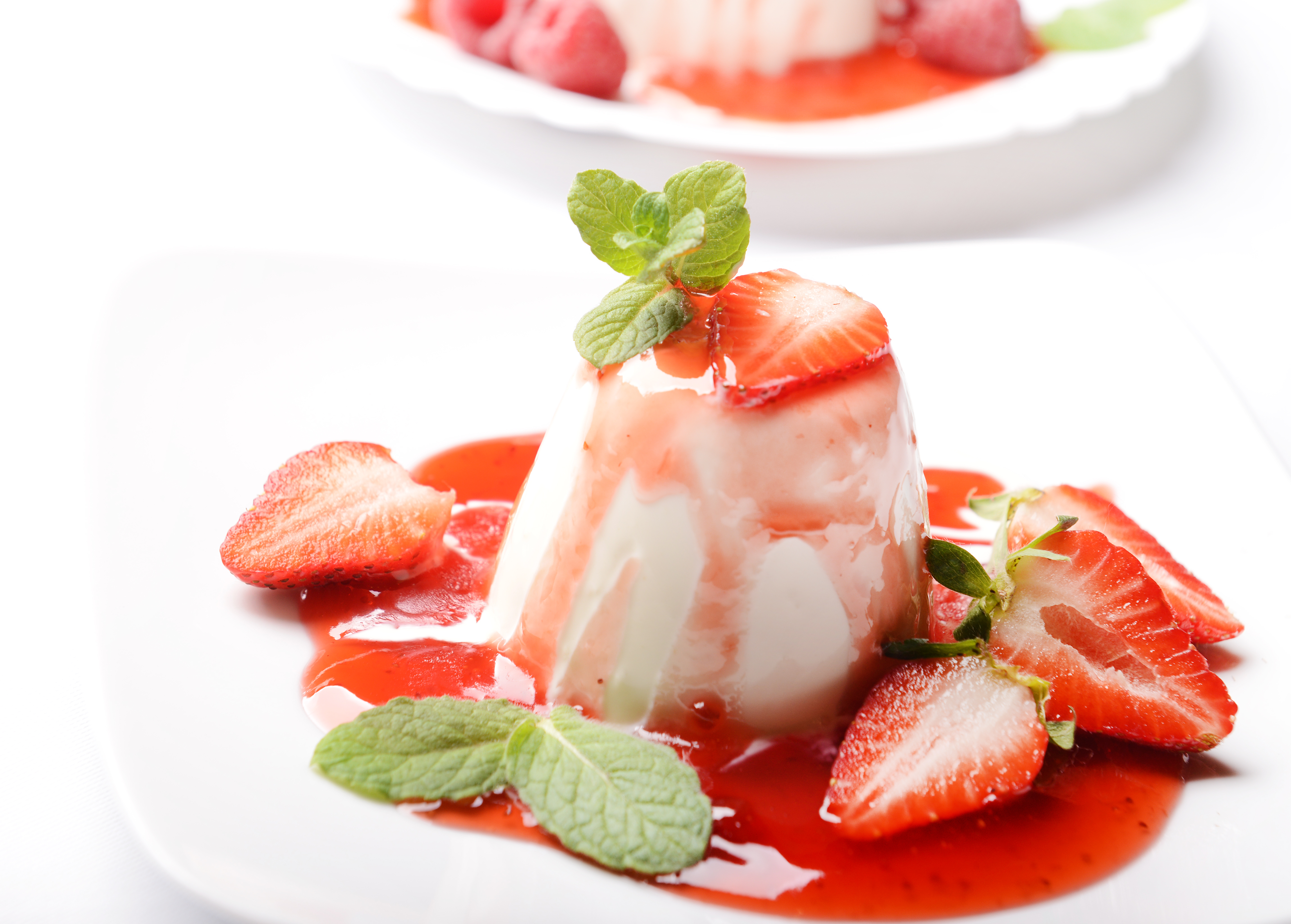 Italian dessert panna cotta with fresh strawberries